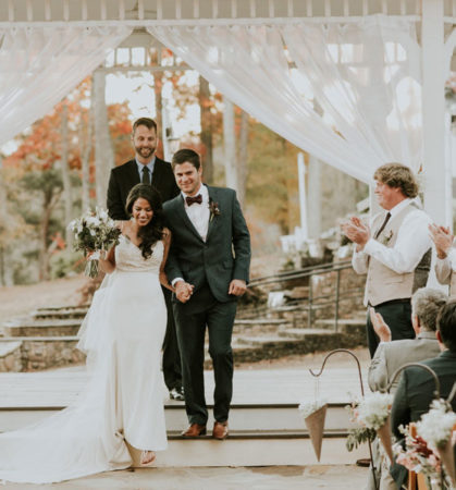 bride and groom walking down the aisle