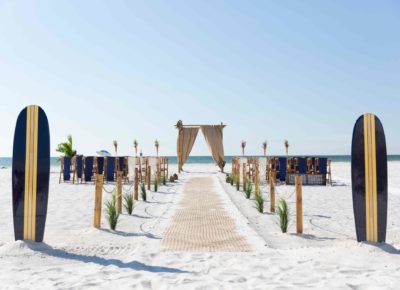 Luau-themed wedding on the beach