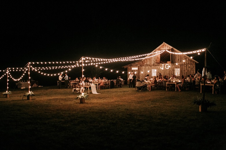 illuminated barn at night