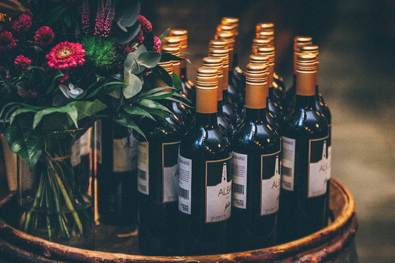 Bottles of red wine at a wedding