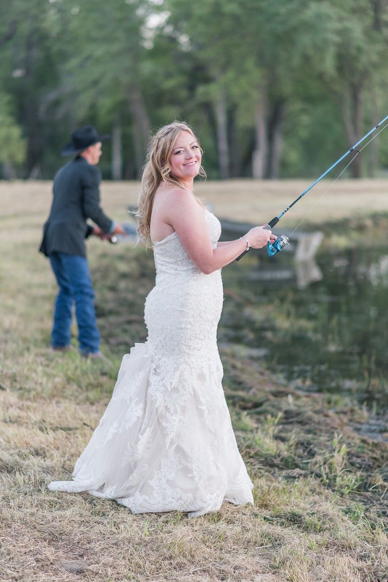 bride in wedding dress fishing