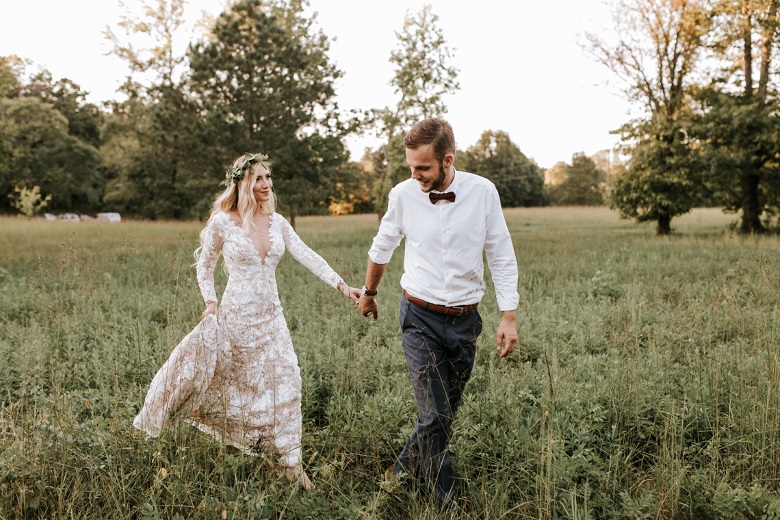 couple photo in grass field