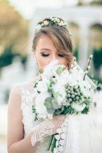 happy bride holding flowers