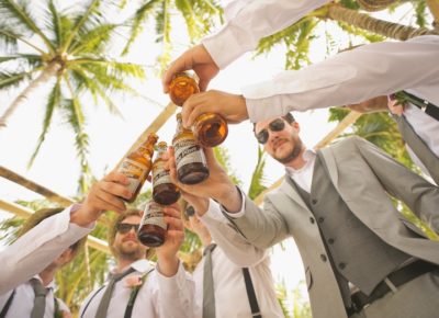 groomsmen enjoying a beer