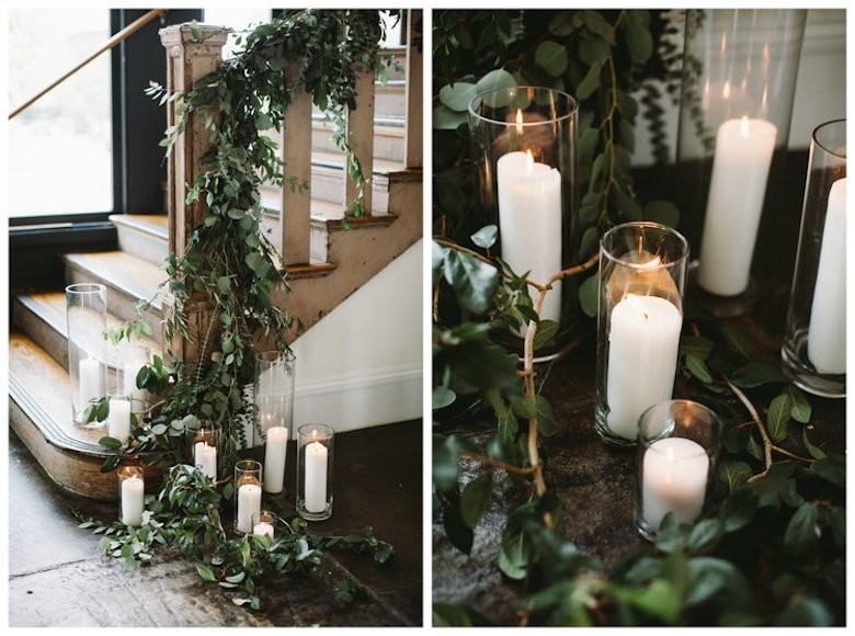 green ivy and white candles