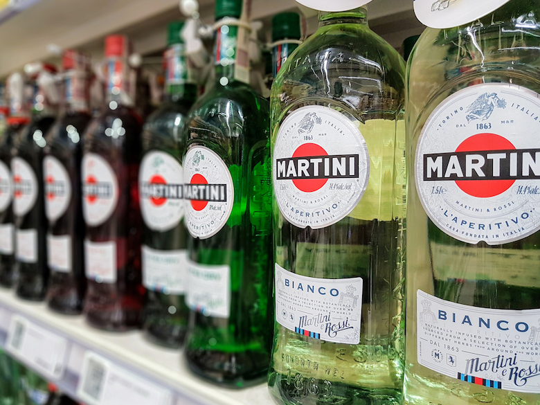 Three different types of vermouth bottles for making martinis