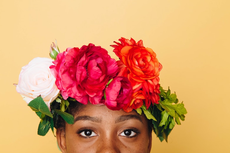 Bright flower crown on girl's head