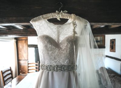 A wedding dress hanging for display
