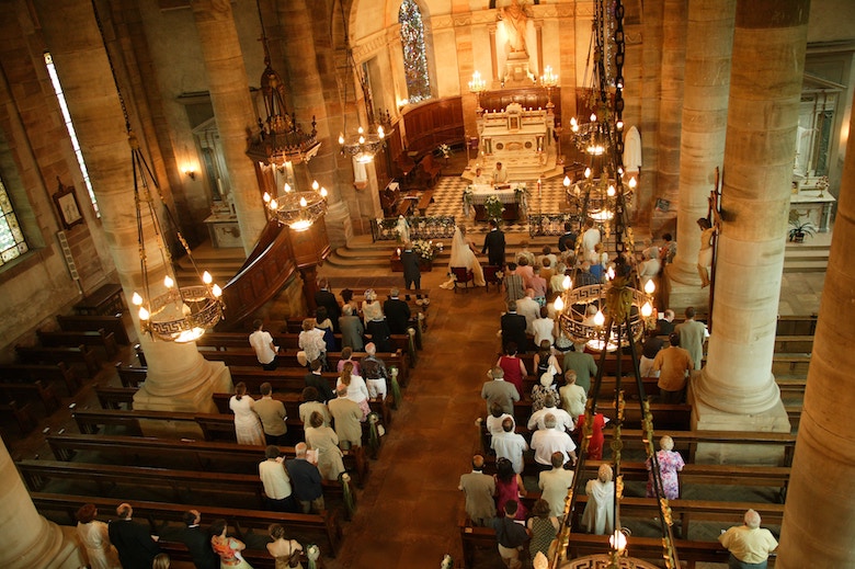 overhead view of a wedding ceremony being held in a church or cathedral