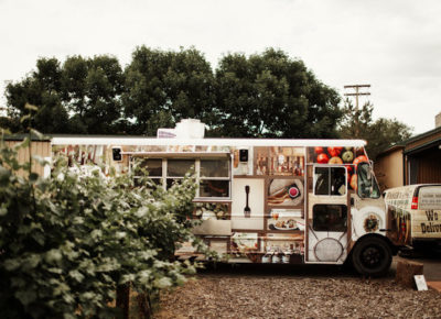 Wedding food truck, with colorful food images painted on the side