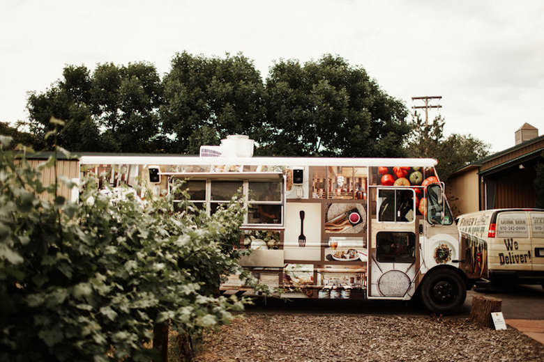 Wedding food truck, with colorful food images painted on the side