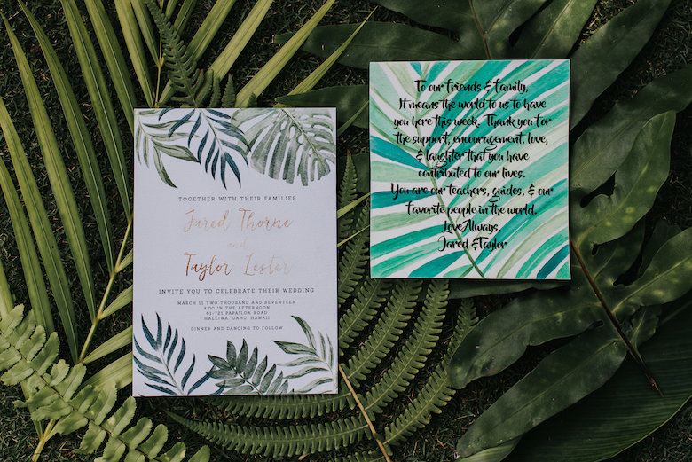 wedding invitation with a nice green background of foliage and ferns