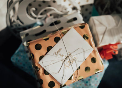 pile of wedding gifts, polka dot package on top