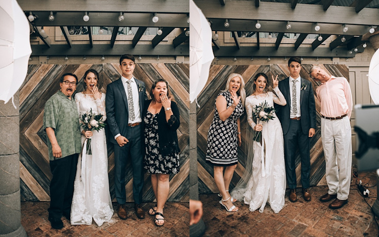 guest at a wedding posing for photos at a photo station