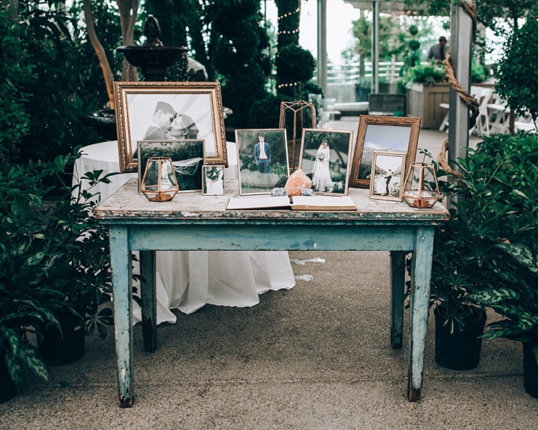 wedding table centerpiece with picture frames