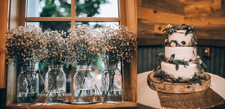 baby breath mason jar wedding centerpiece. white tier wedding cake with dried leaves