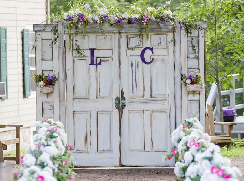 country wedding backdrop made from old barn doors