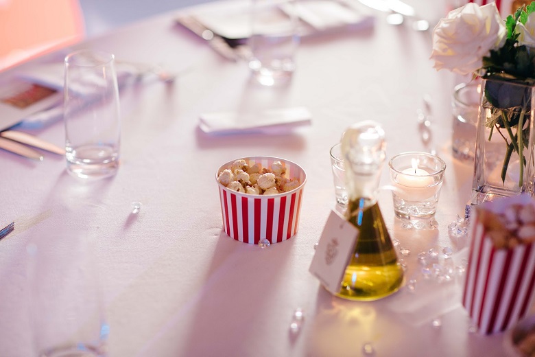 popcorn served in vintage paper bags