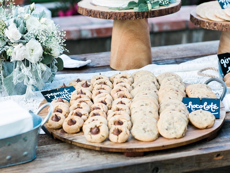 peanut butter and chocolate cookies on a wooden platter