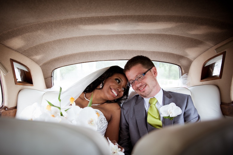 Husband and wife ride home in a limo