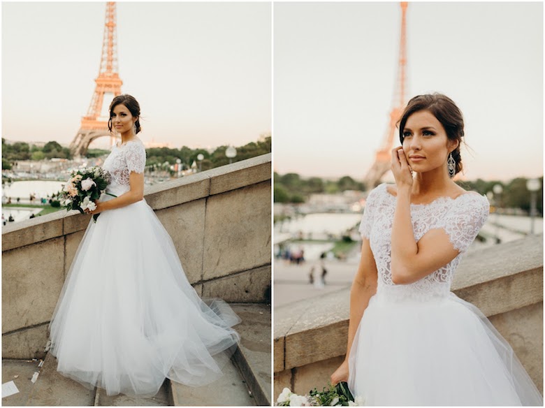 bride in wispy dress holding flowers in front of the eiffel tower