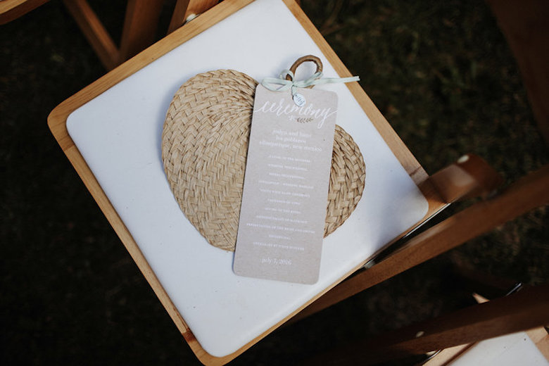 wedding program on handheld fan for garden weddings
