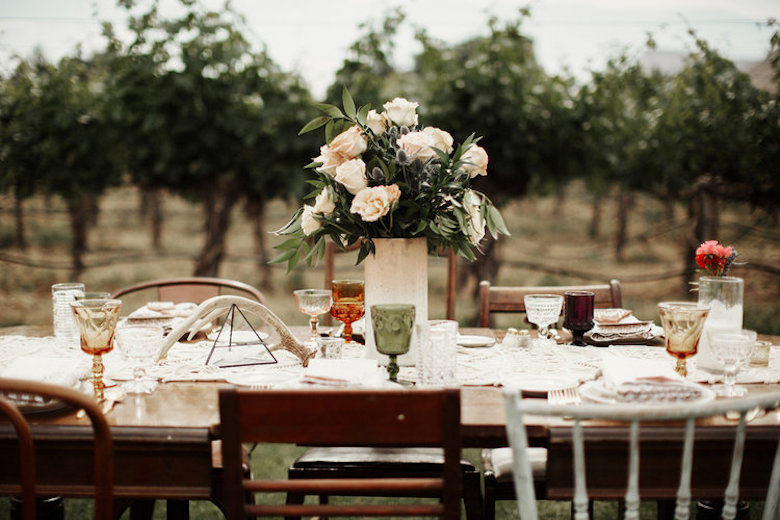 whimsical plateware on top of a wedding table