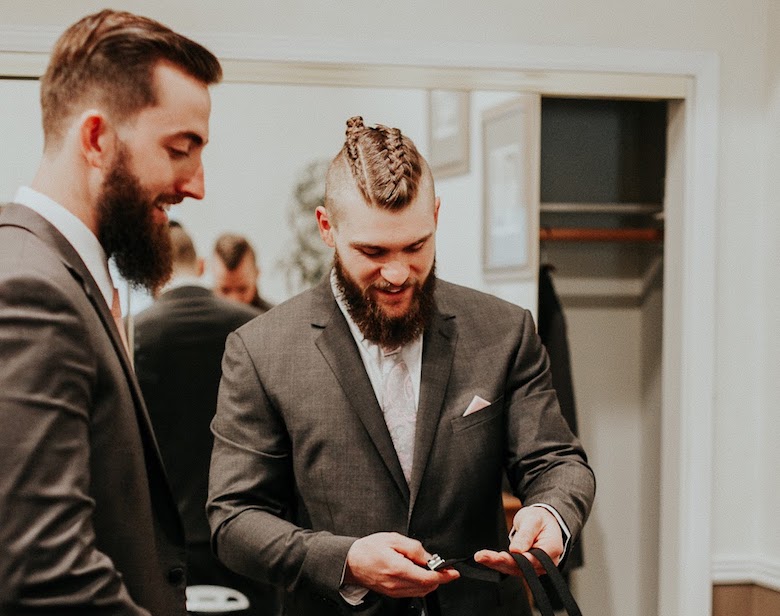 groom with a single dutch braid