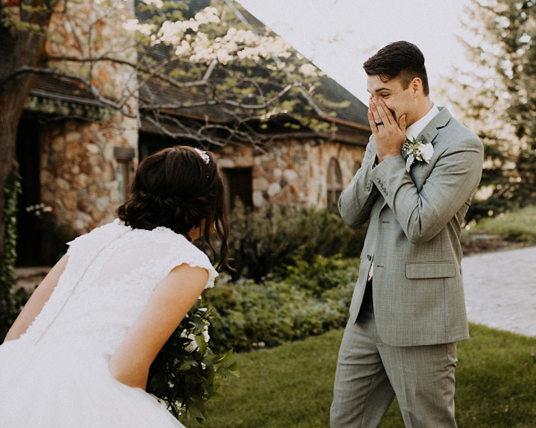 groom surprised at seeing bride for the first time wedding