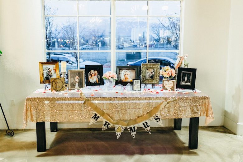 bride and groom's photographs for wedding table decorations