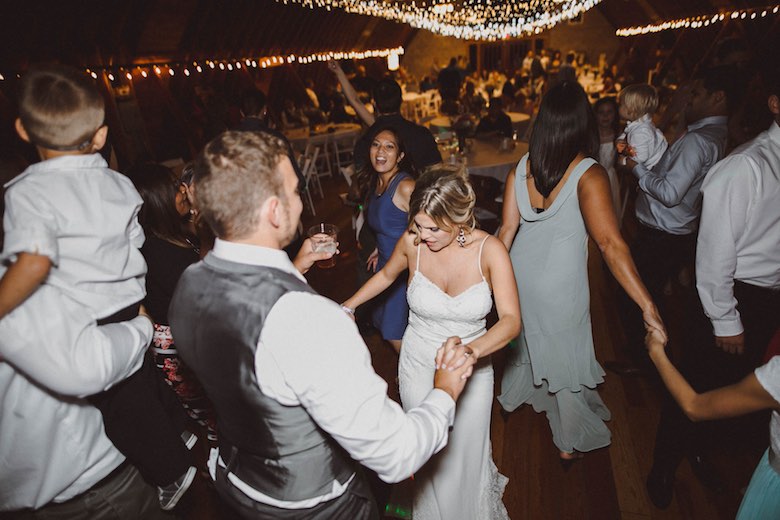 bride and wedding guests dancing on the dance floor