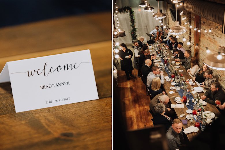 placement card and welcome sign with wedding guests seated at the reception