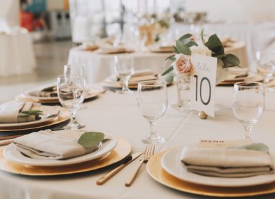 table setting with plates, dining ware, and seating number 10