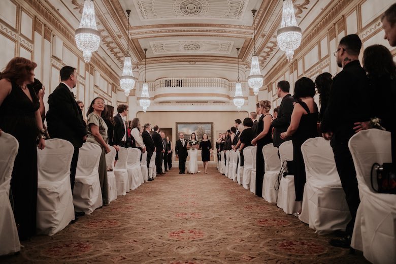 bride being walked down aisle