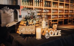 wedding gift table with a mailbox and other decorations