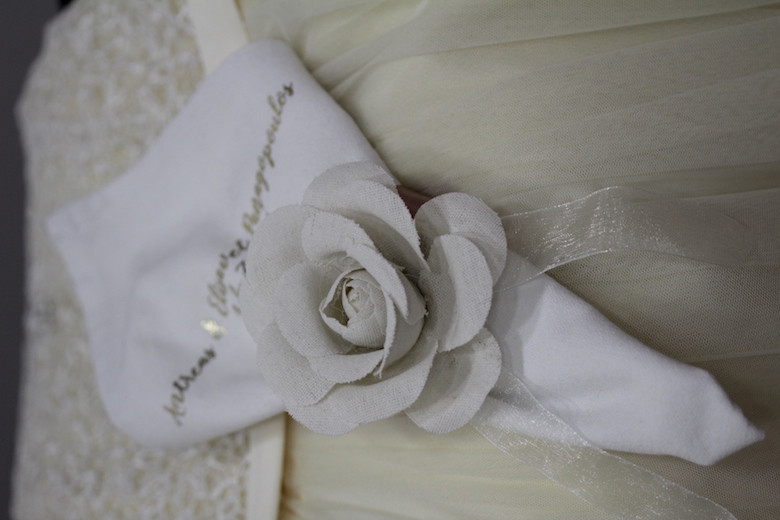 personalized cloth napkins on table as wedding favors 