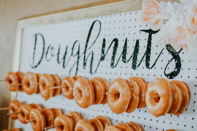donuts hung on a board